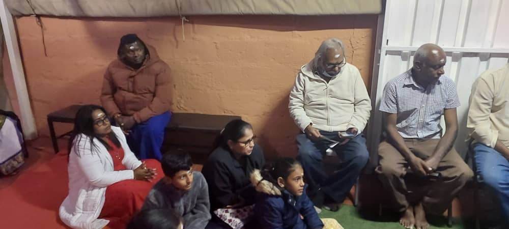 Family receiving blessings
